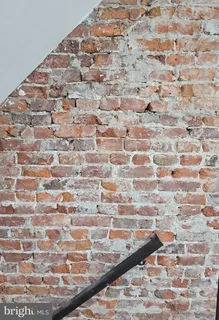 a kitchen with granite countertop a stove and a sink
