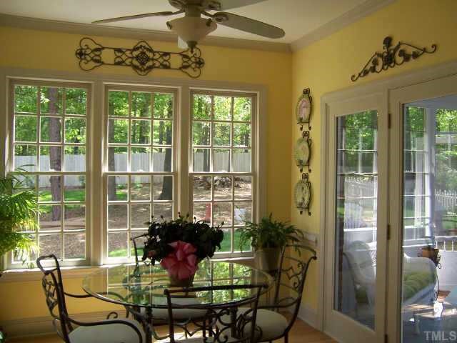 6200 Godfrey Drive Raleigh, NC 27612 - Photo 6 of 11 a living room with furniture and a potted plant
