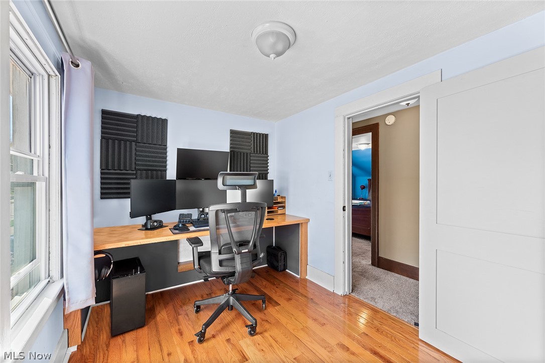 382 Baldwin Road Akron, OH 44312 - Photo 22 of 35 Carpeted office space featuring a wealth of natural light and built in desk