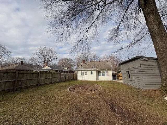 a bathroom with a shower and toilet