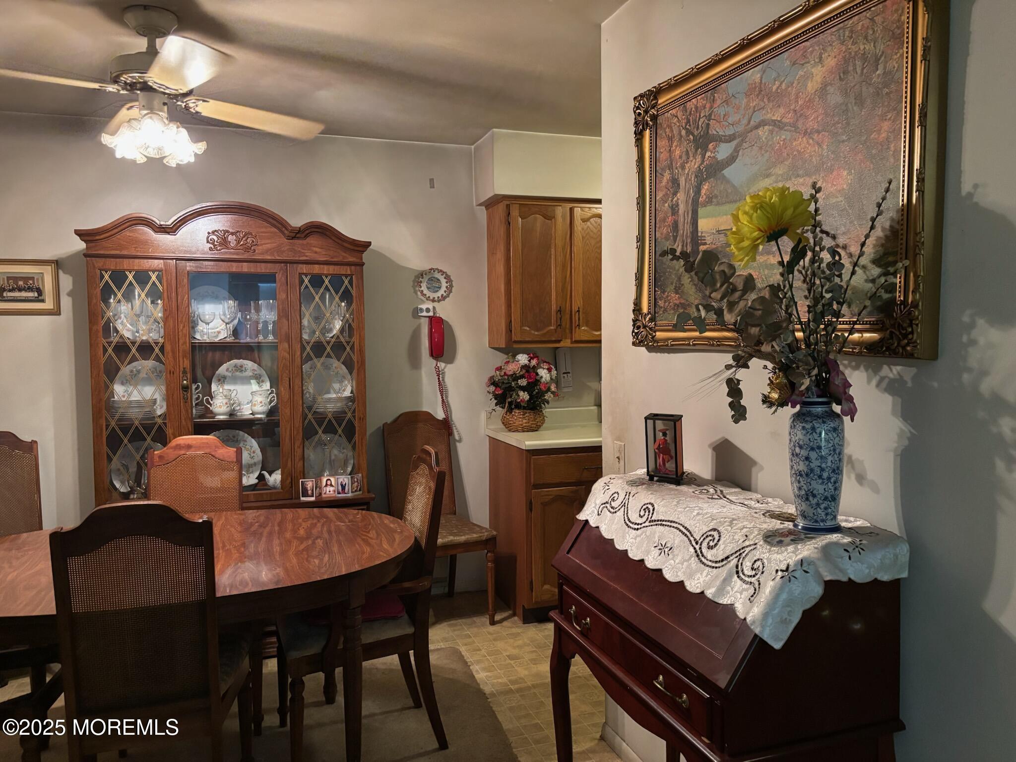 3 Swift Circle, Unit D Whiting, NJ 08759 - Photo 16 of 34 a view of a dining room with furniture and a chandelier