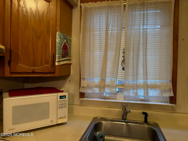 a bathroom with a sink and a bathtub