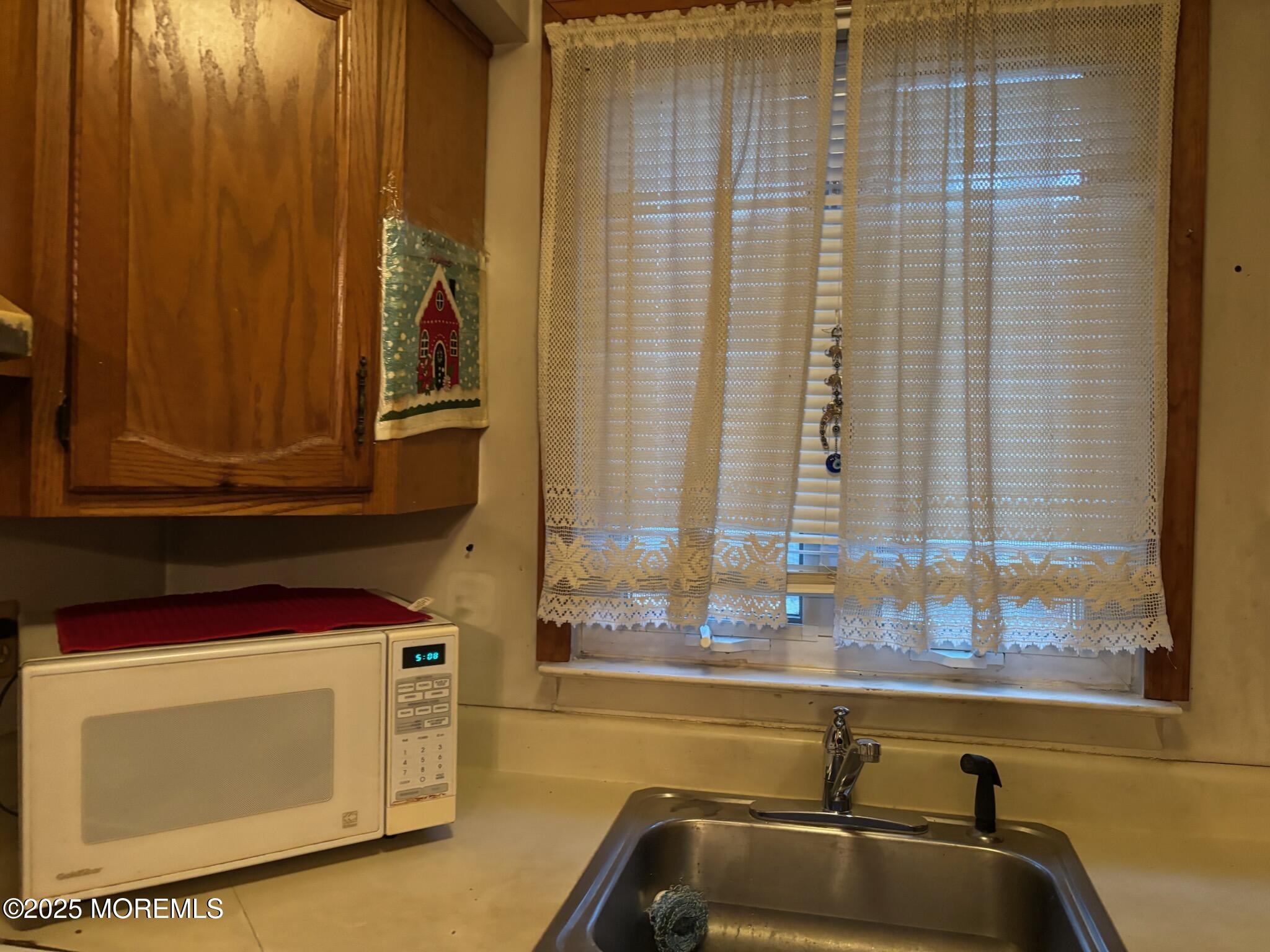 3 Swift Circle, Unit D Whiting, NJ 08759 - Photo 22 of 34 a bathroom with a sink and a bathtub