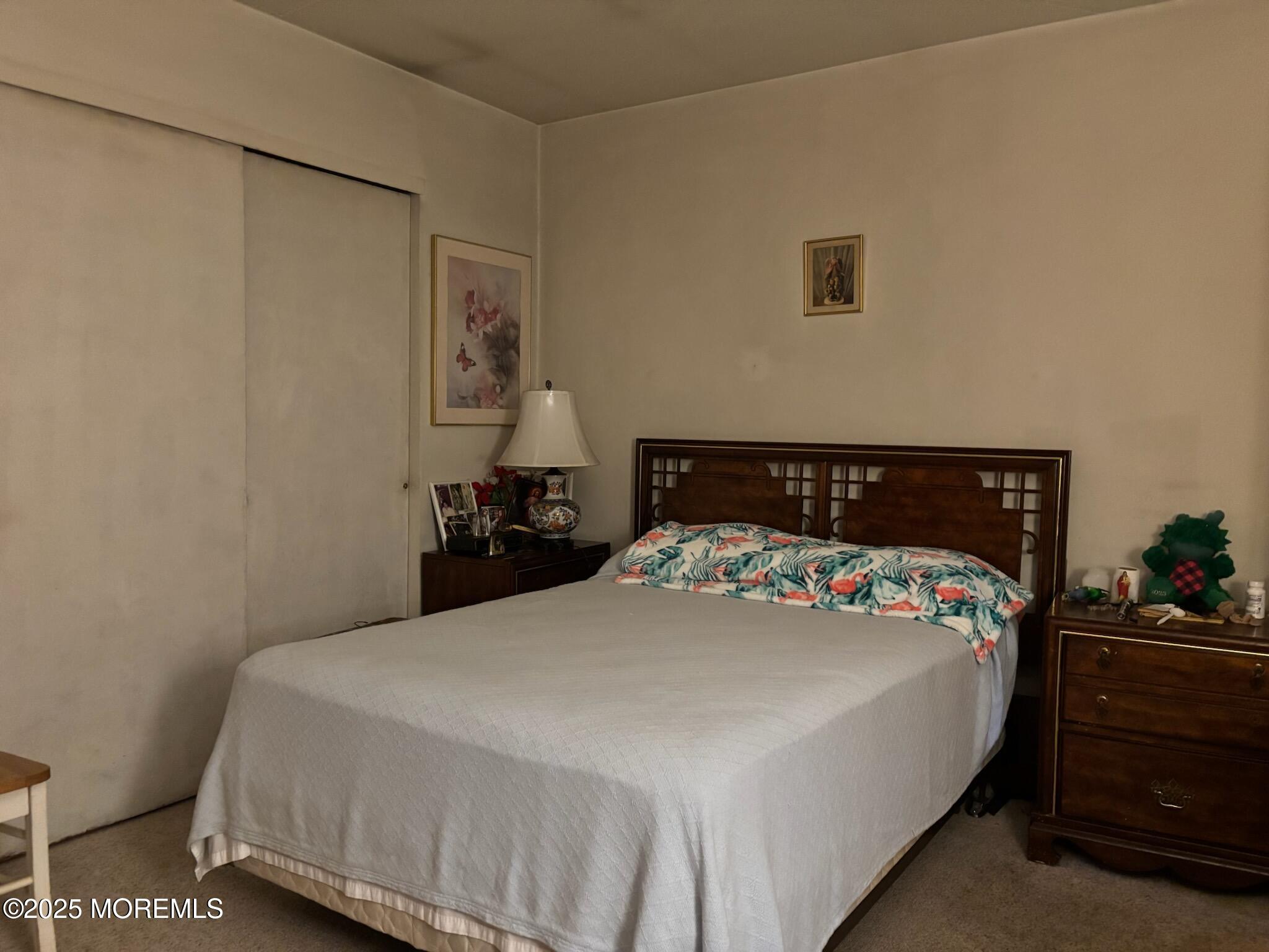 3 Swift Circle, Unit D Whiting, NJ 08759 - Photo 27 of 34 a bedroom with a bed and window