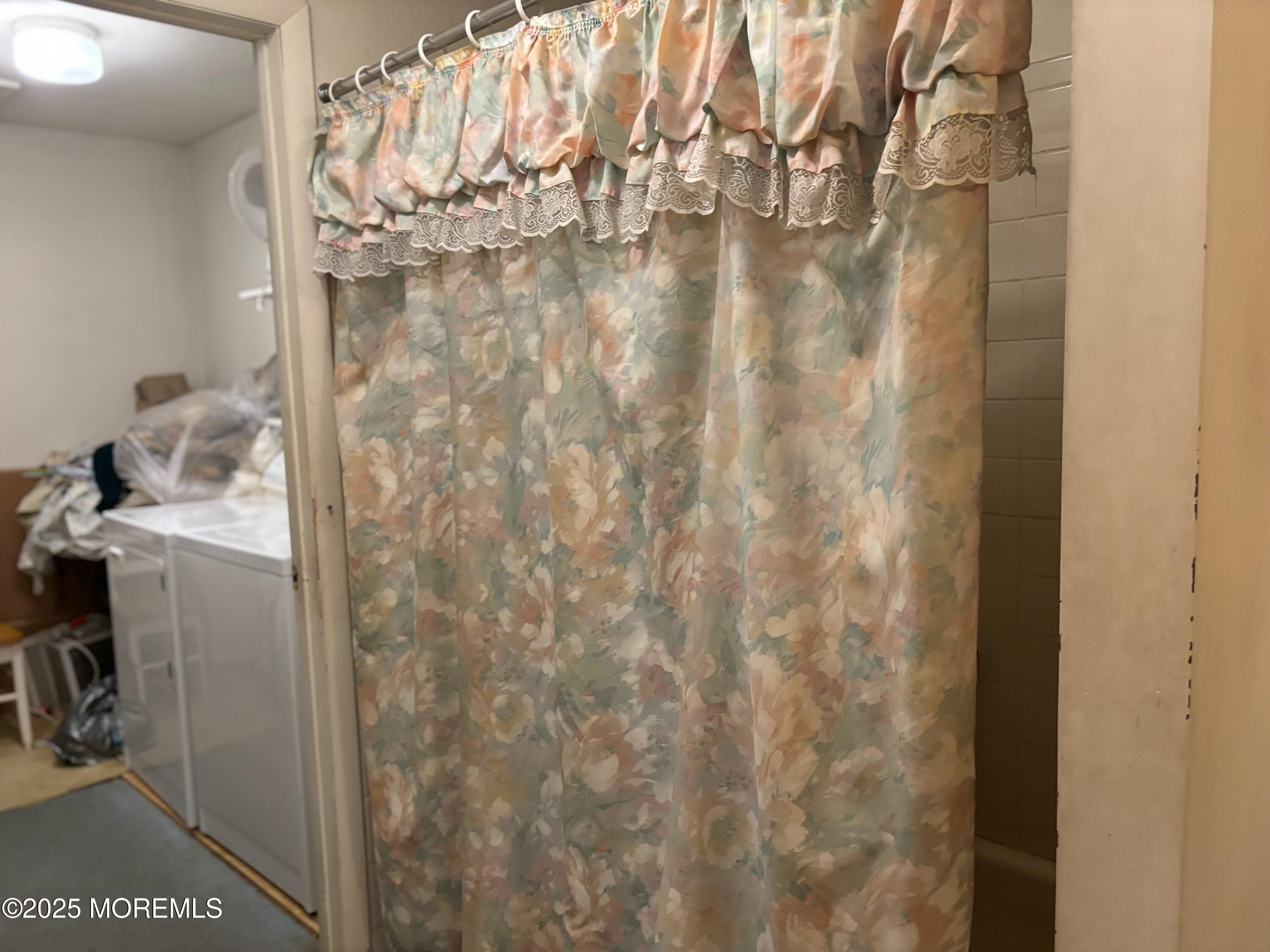 3 Swift Circle, Unit D Whiting, NJ 08759 - Photo 33 of 34 a bathroom with a sink and mirror