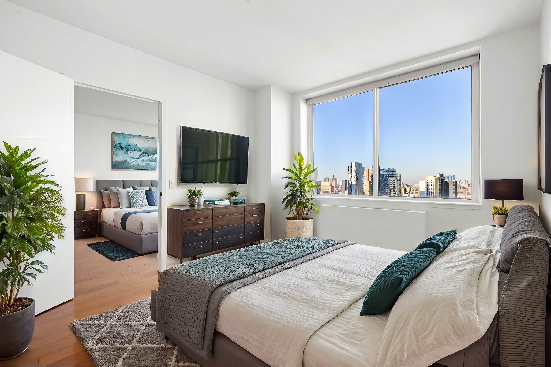 80 Dekalb Avenue, Unit 30C Brooklyn, NY 11201 - Photo 5 of 28 a bedroom with a balcony a bed and a couch