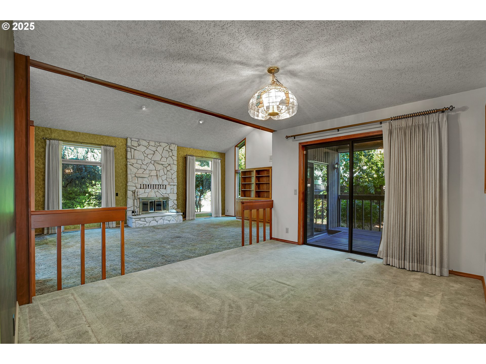 8710 Southeast 57th Avenue Portland, OR 97206 - Photo 14 of 47 a view of a livingroom with furniture wooden floor and chandelier