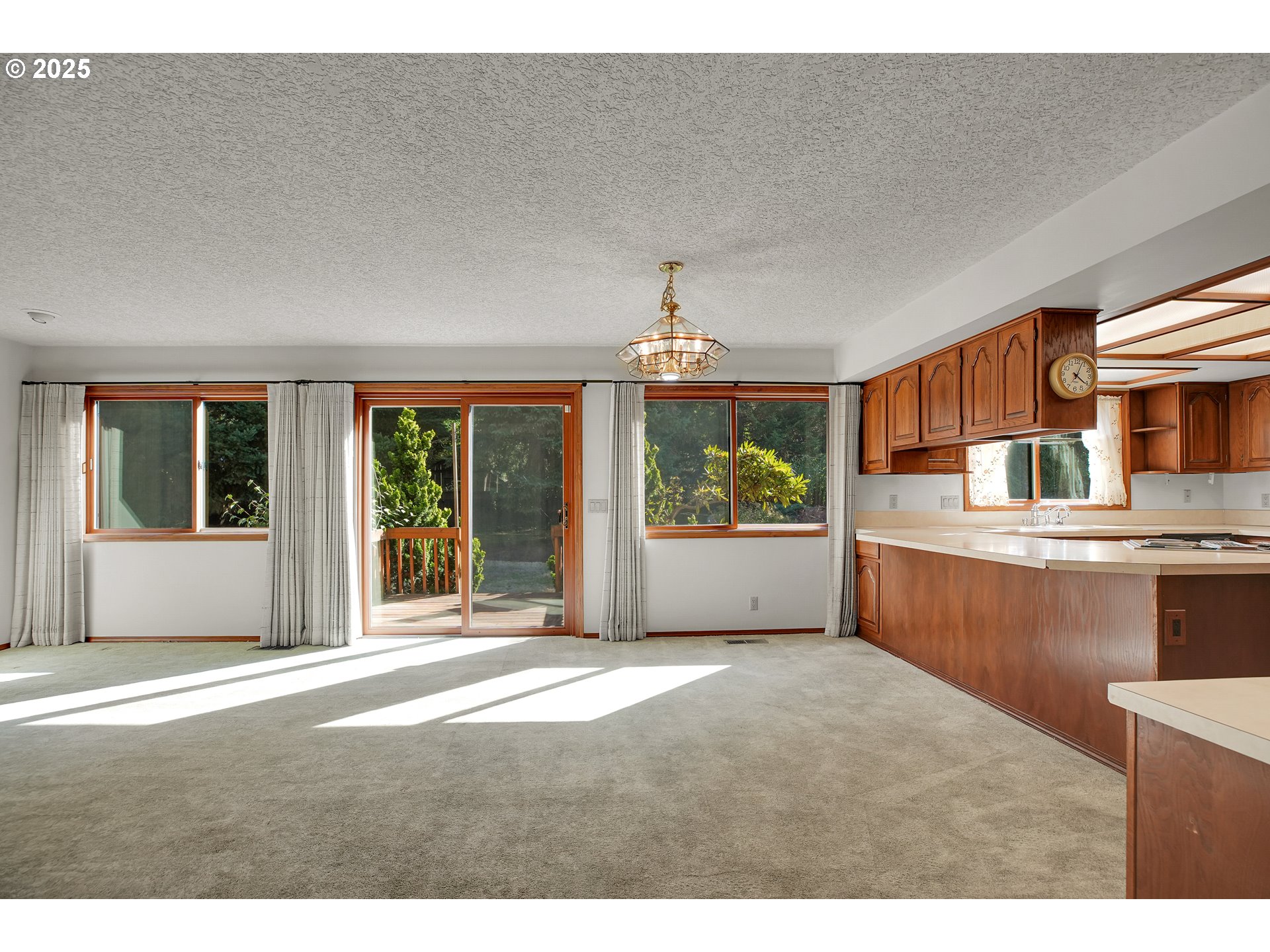 8710 Southeast 57th Avenue Portland, OR 97206 - Photo 16 of 47 a living room with furniture and a window