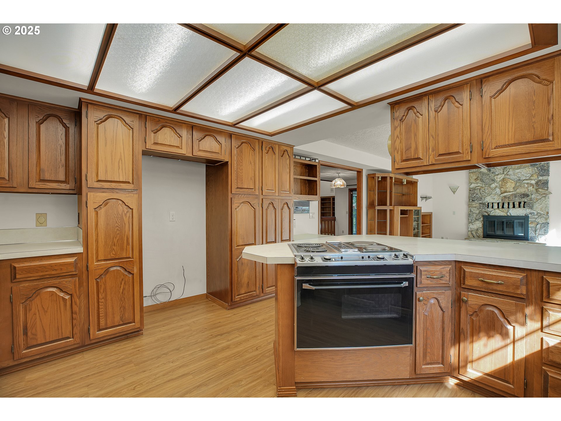 8710 Southeast 57th Avenue Portland, OR 97206 - Photo 21 of 47 a kitchen with stainless steel appliances granite countertop a stove and a refrigerator