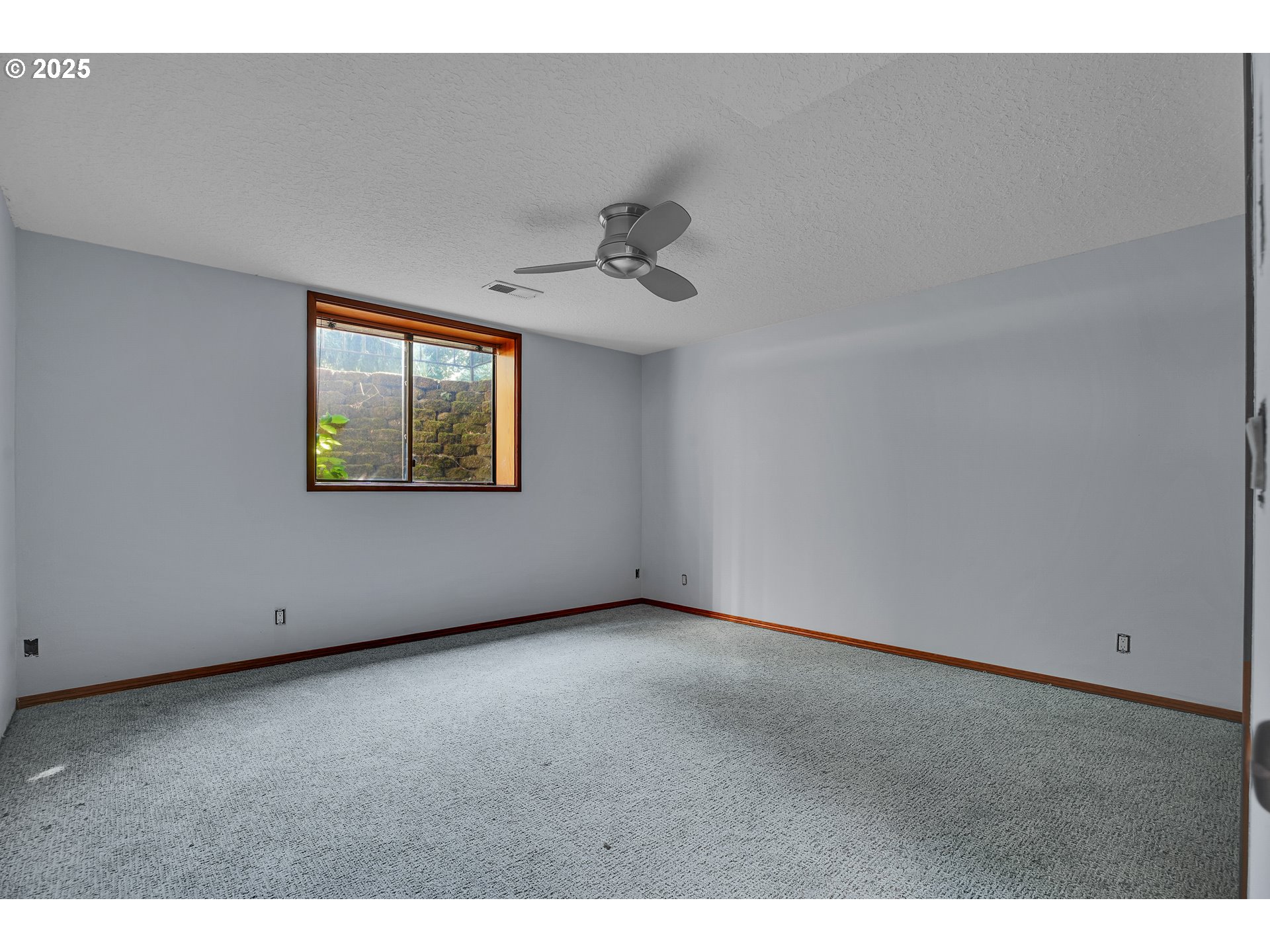 8710 Southeast 57th Avenue Portland, OR 97206 - Photo 36 of 47 a view of an empty room with a window
