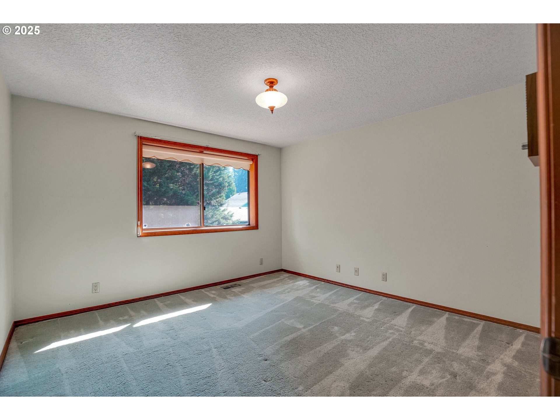 8710 Southeast 57th Avenue Portland, OR 97206 - Photo 41 of 47 a view of an empty room with a window