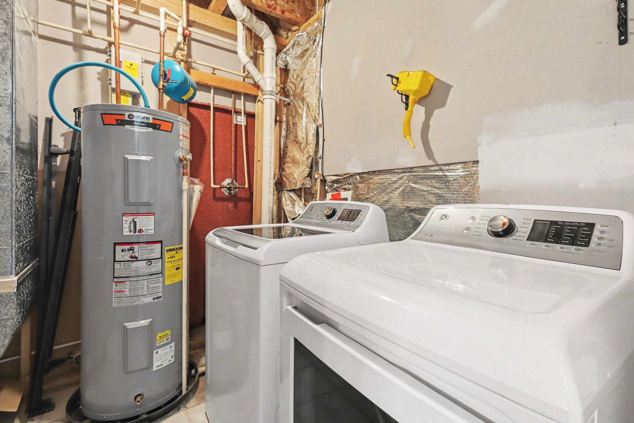 876 Campers Lane Ruther Glen, VA 22546 - Photo 18 of 27 a utility room with dryer and washer