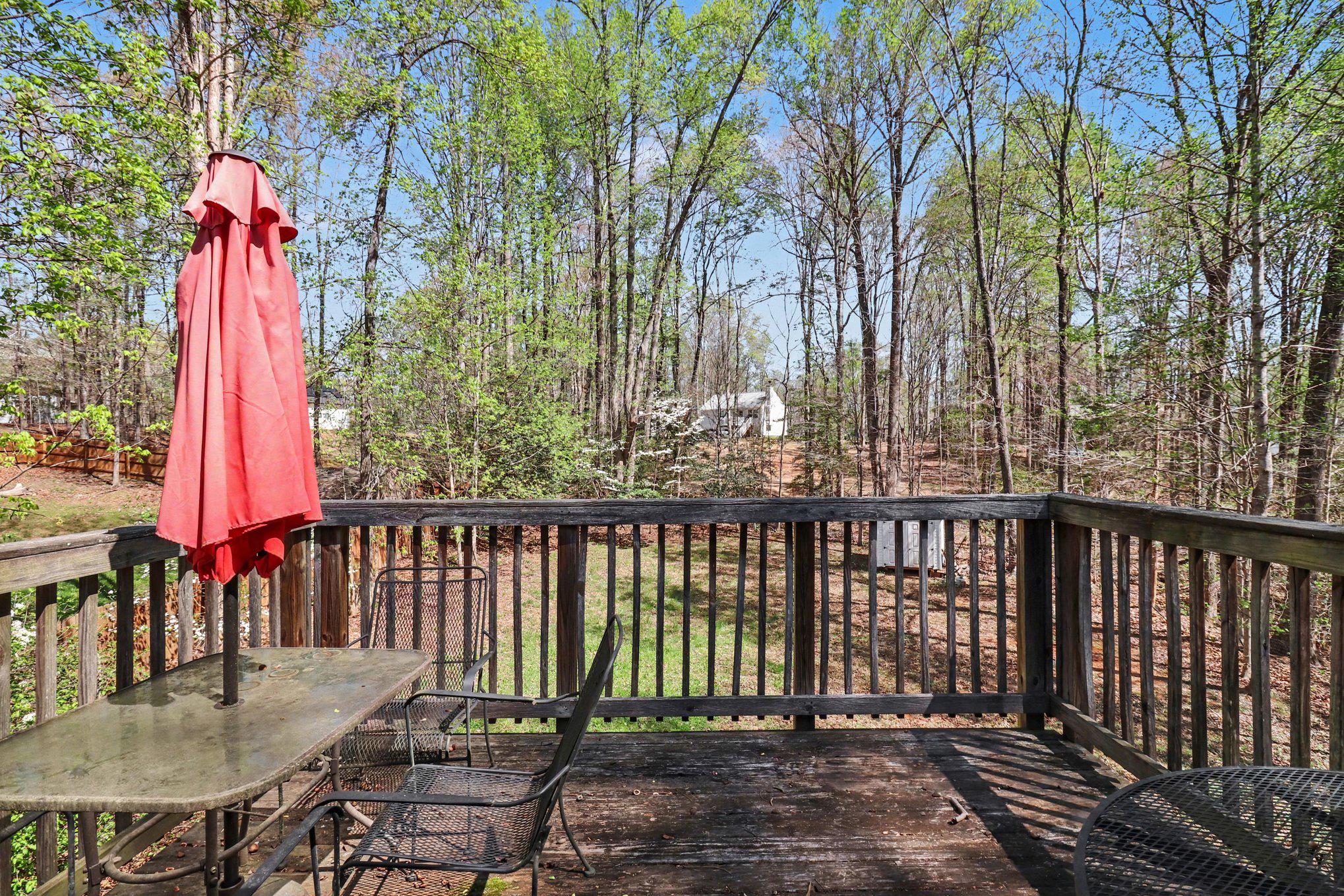 876 Campers Lane Ruther Glen, VA 22546 - Photo 21 of 27 a view of a balcony with furniture