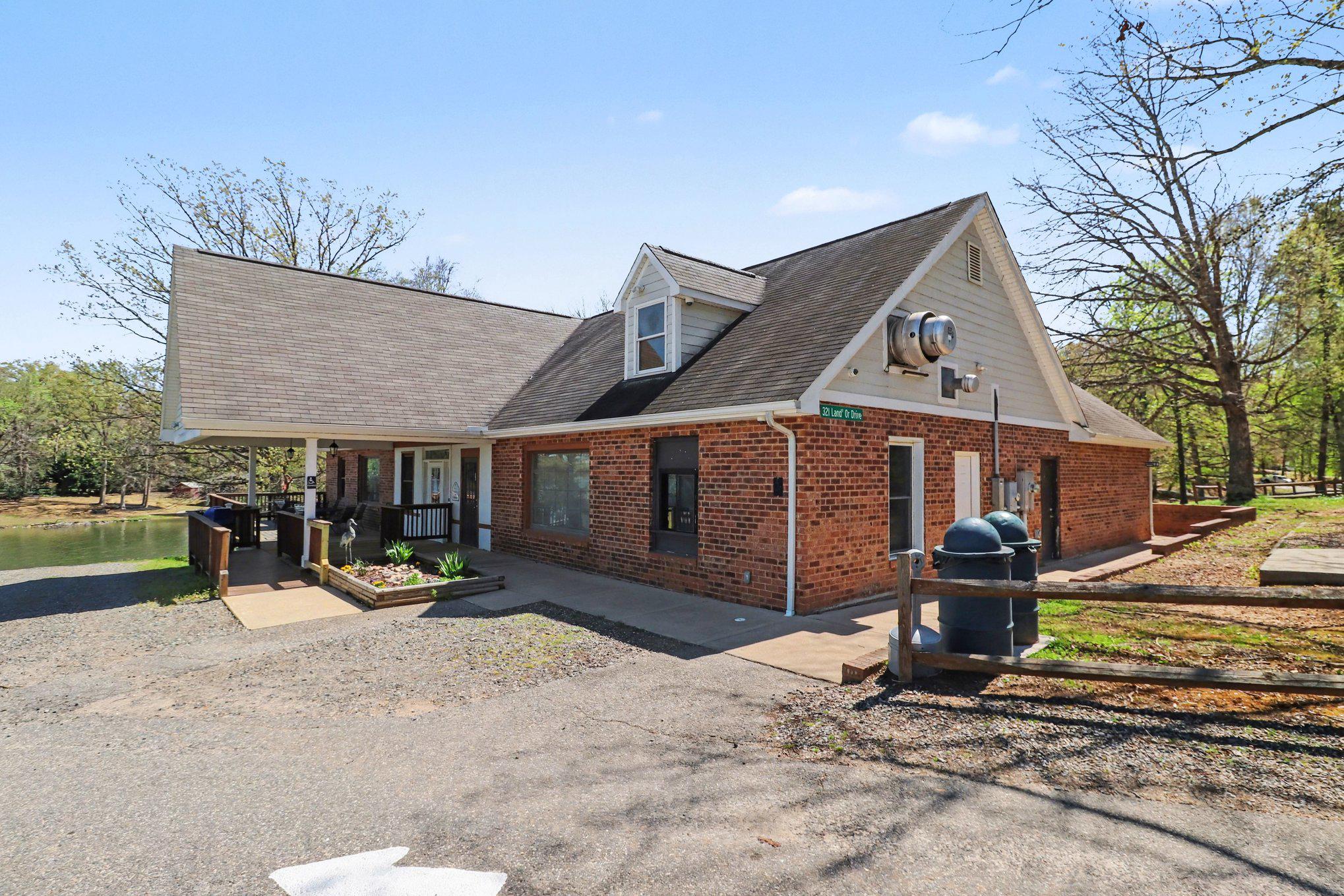 876 Campers Lane Ruther Glen, VA 22546 - Photo 23 of 27 a view of a house with a yard and sitting area