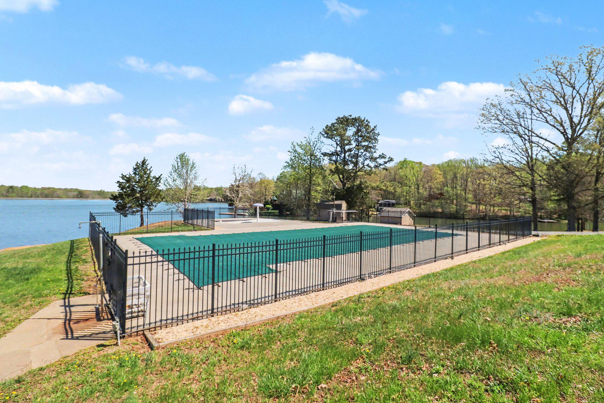 876 Campers Lane Ruther Glen, VA 22546 - Photo 24 of 27 a view of a backyard and grass