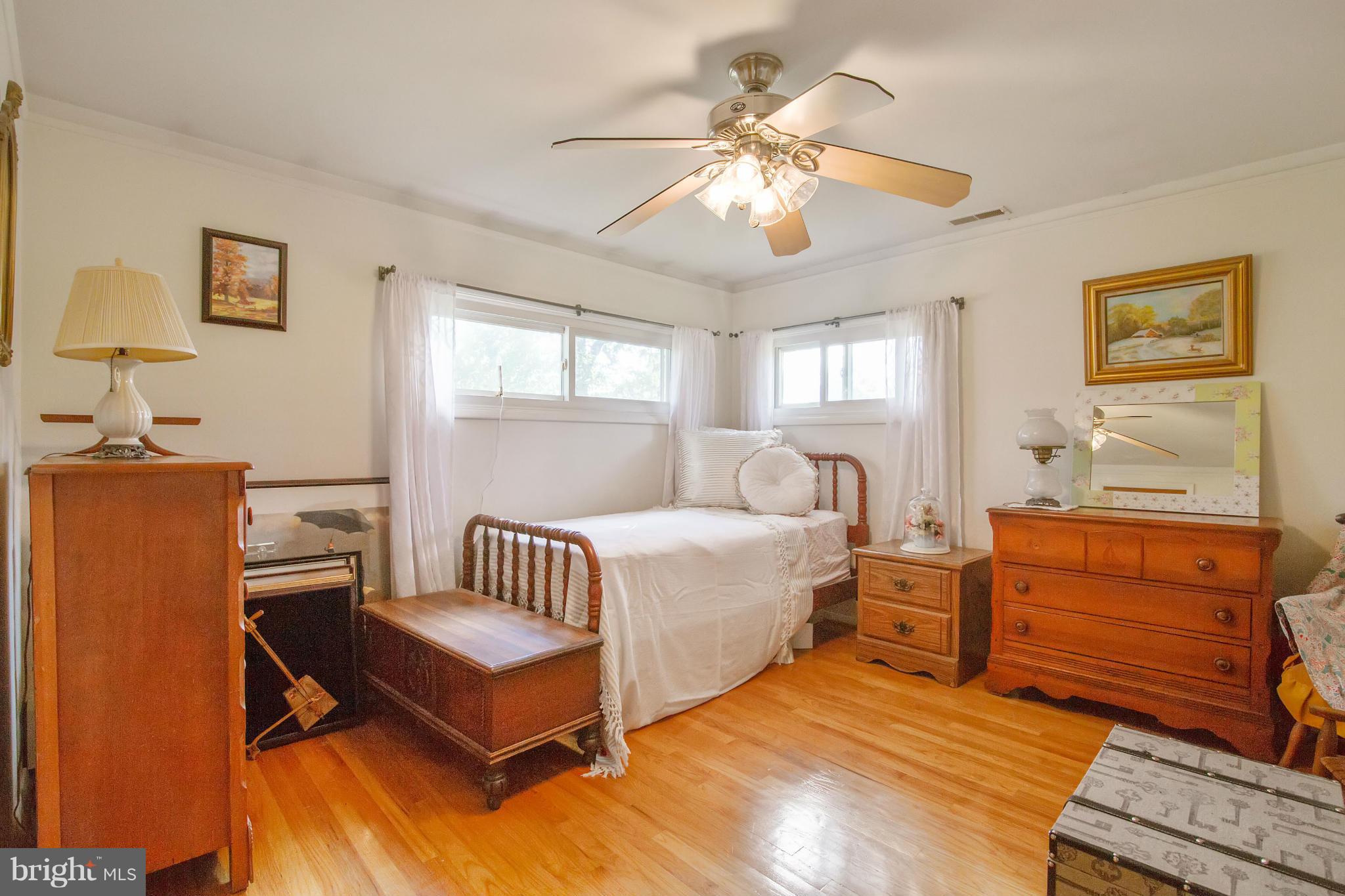 451 West Maple Road Linthicum Heights, MD 21090 - Photo 15 of 30 a bedroom with furniture and a window