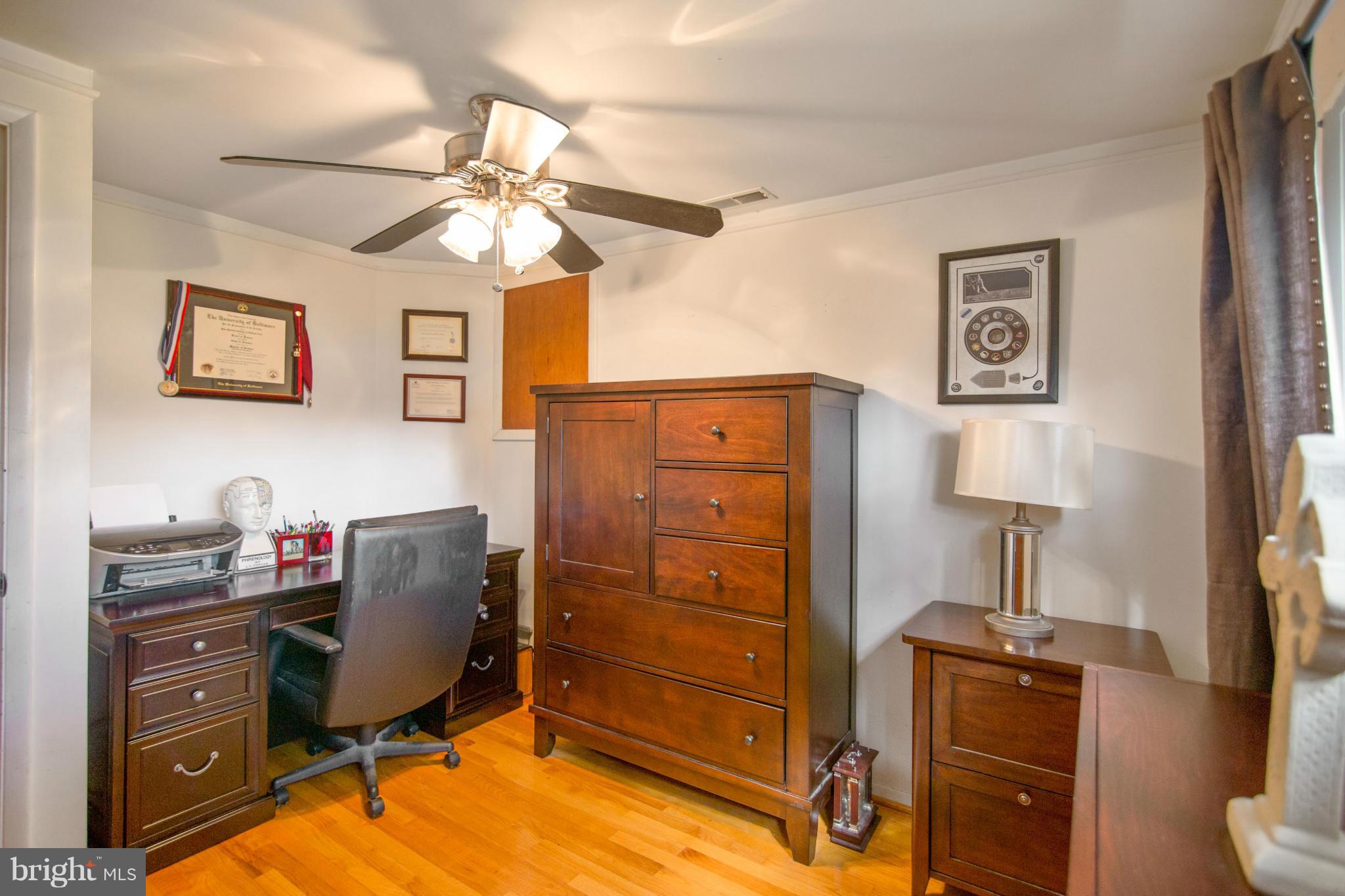 451 West Maple Road Linthicum Heights, MD 21090 - Photo 16 of 30 a view of a workspace with furniture and a window