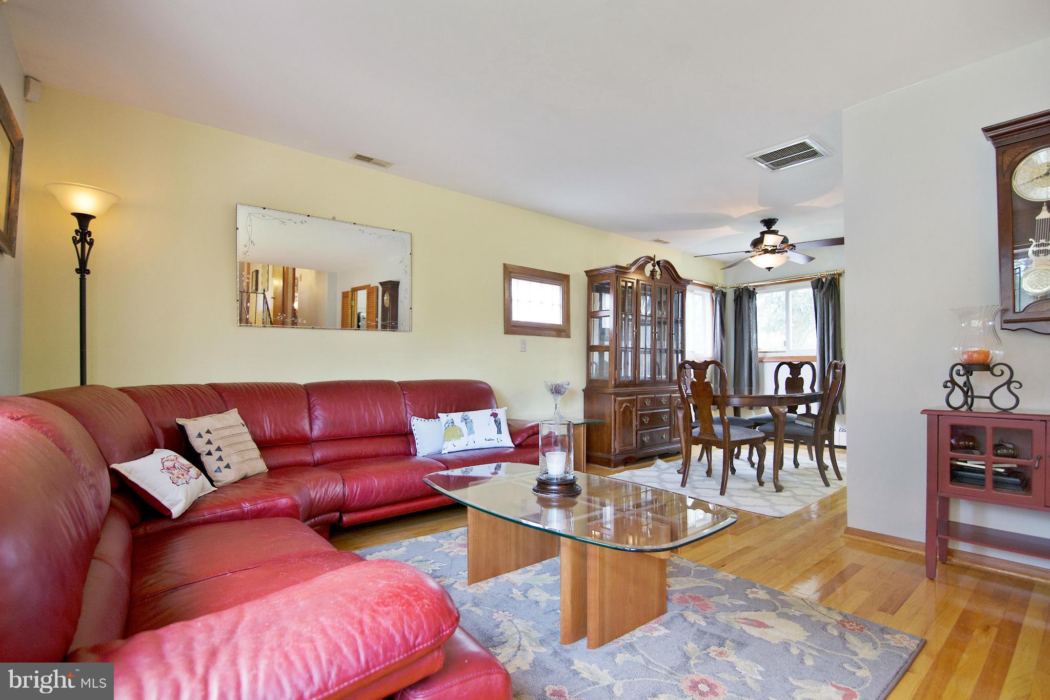 451 West Maple Road Linthicum Heights, MD 21090 - Photo 19 of 30 a living room with furniture and wooden floor