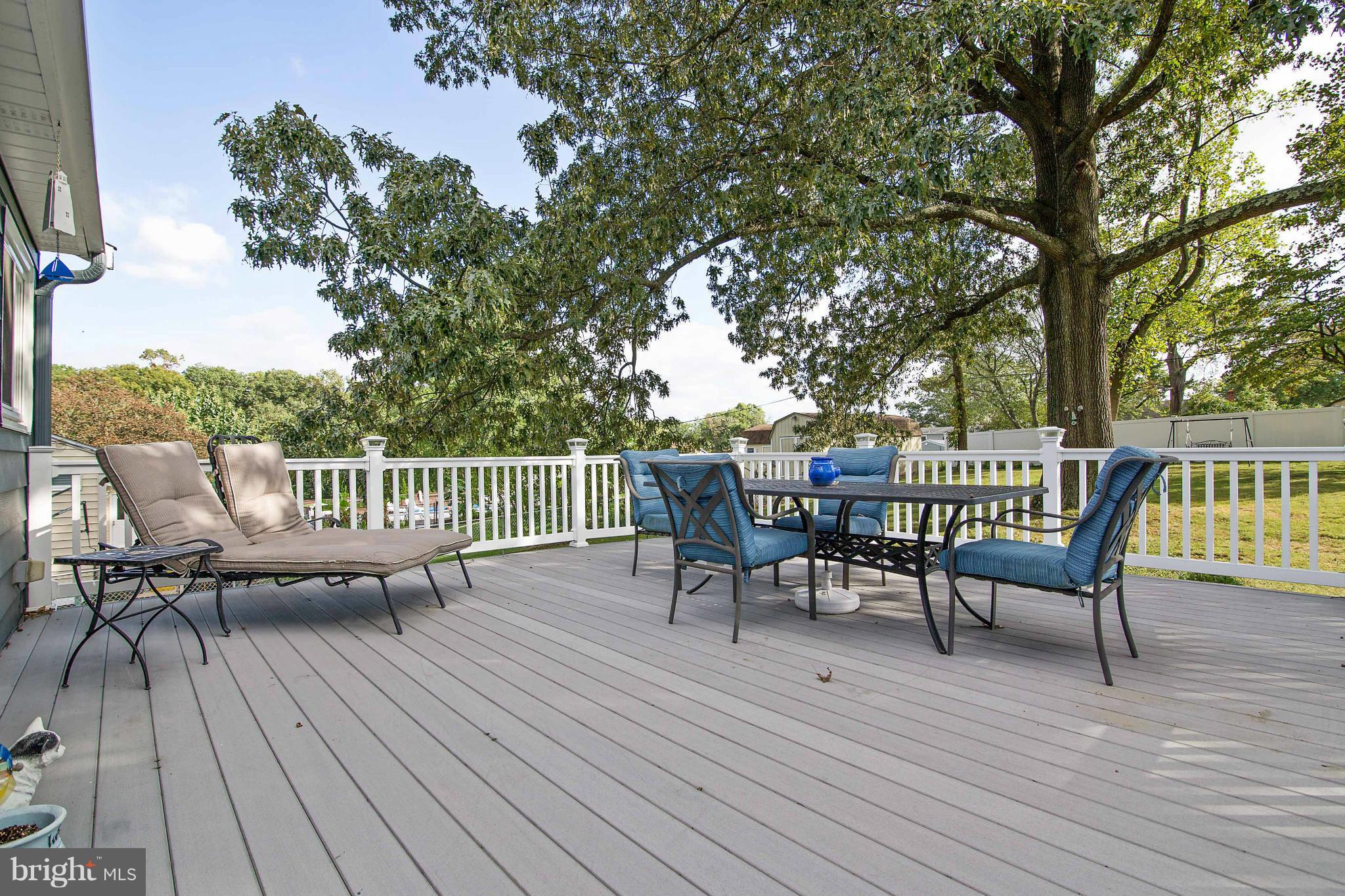 451 West Maple Road Linthicum Heights, MD 21090 - Photo 4 of 30 a view of a chairs on wooden deck