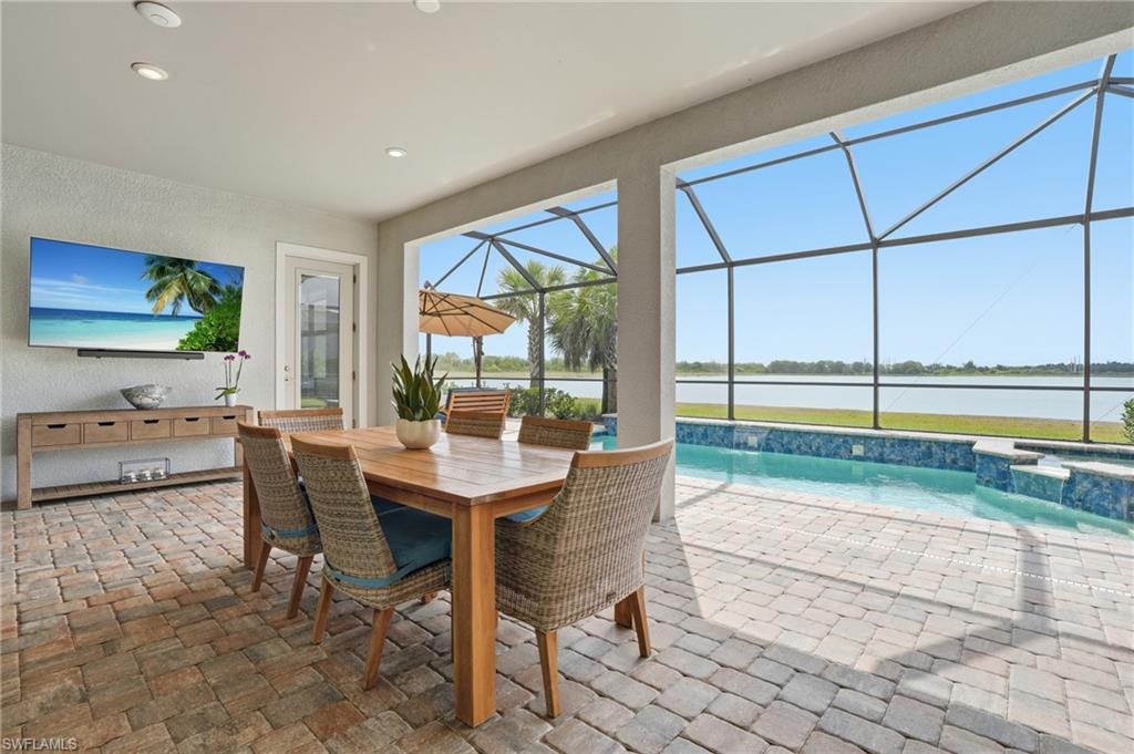 19696 Aqua View Lane Fort Myers, FL 33913 - Photo 32 of 50 a view of a dining room with furniture window and outside view
