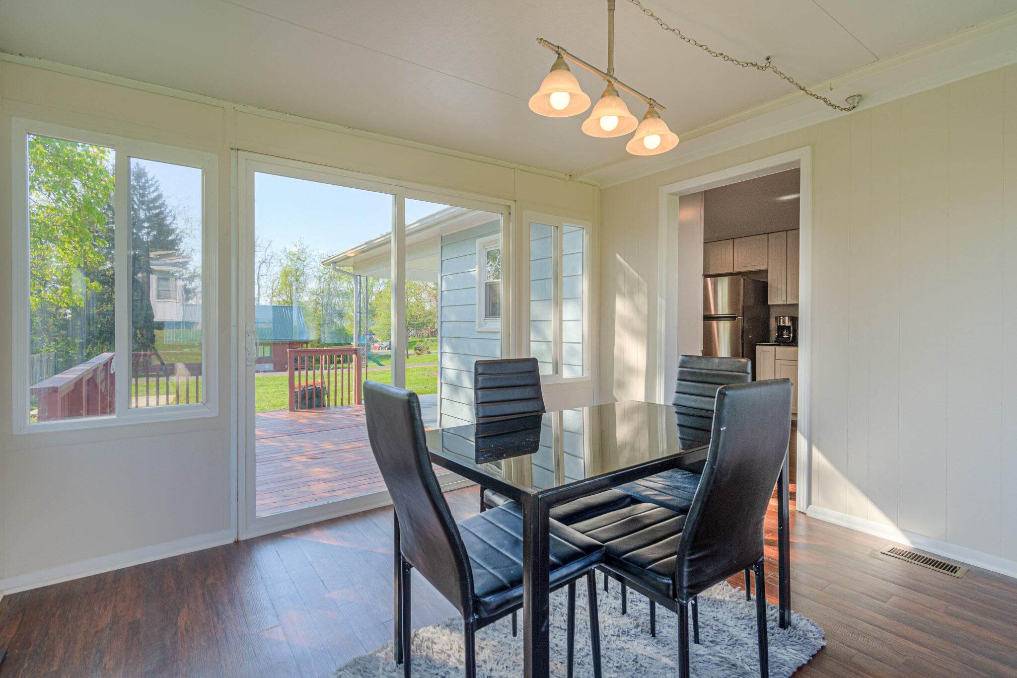 5216 Colonial Drive Dublin, VA 24084 - Photo 16 of 31 a view of a dining room with furniture window and wooden floor