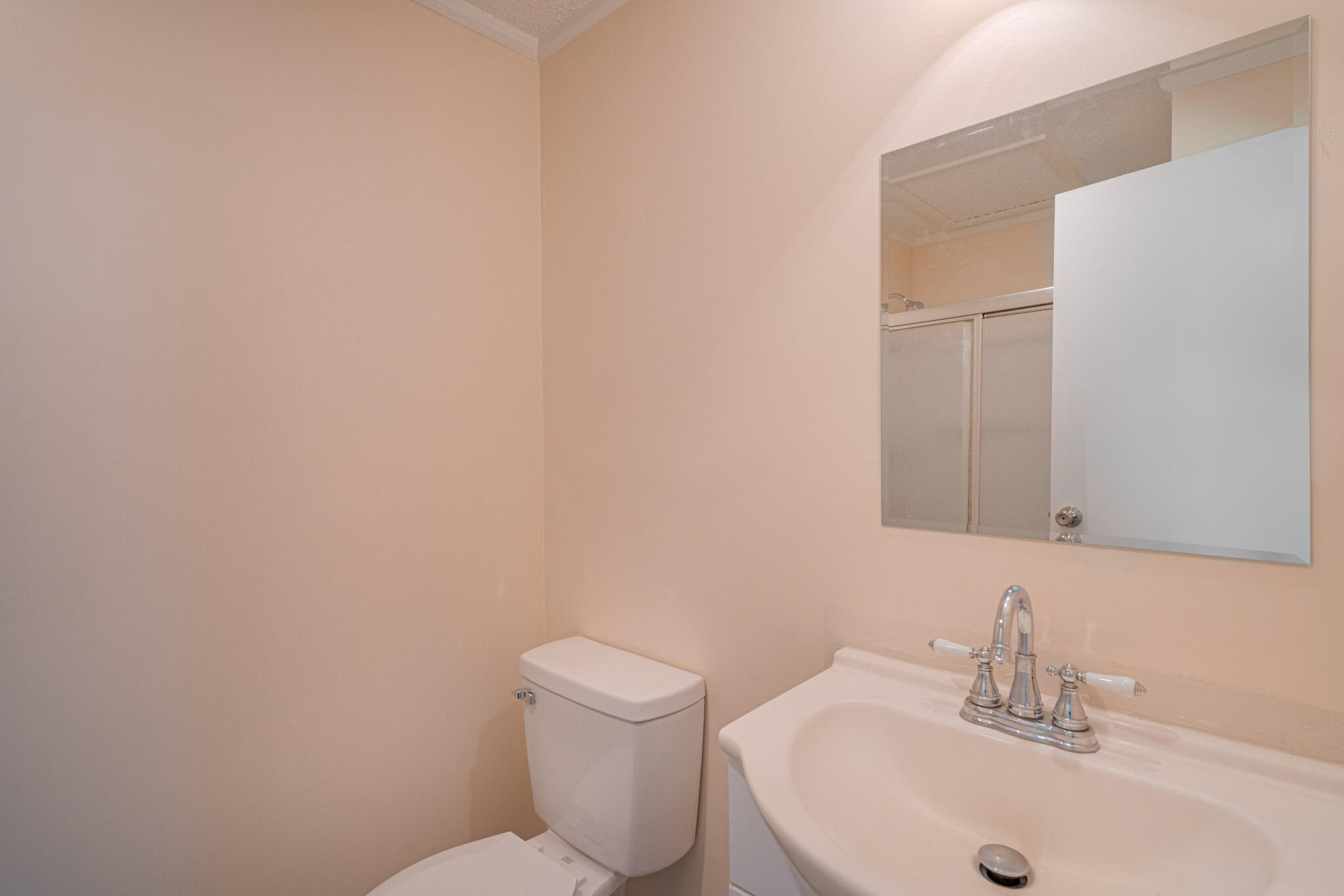 5216 Colonial Drive Dublin, VA 24084 - Photo 19 of 31 a bathroom with a sink a toilet and mirror