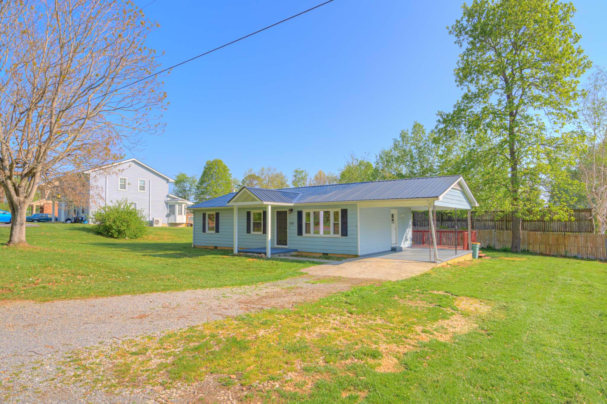 5216 Colonial Drive Dublin, VA 24084 - Photo 2 of 31 a view of a house with a yard and sitting area