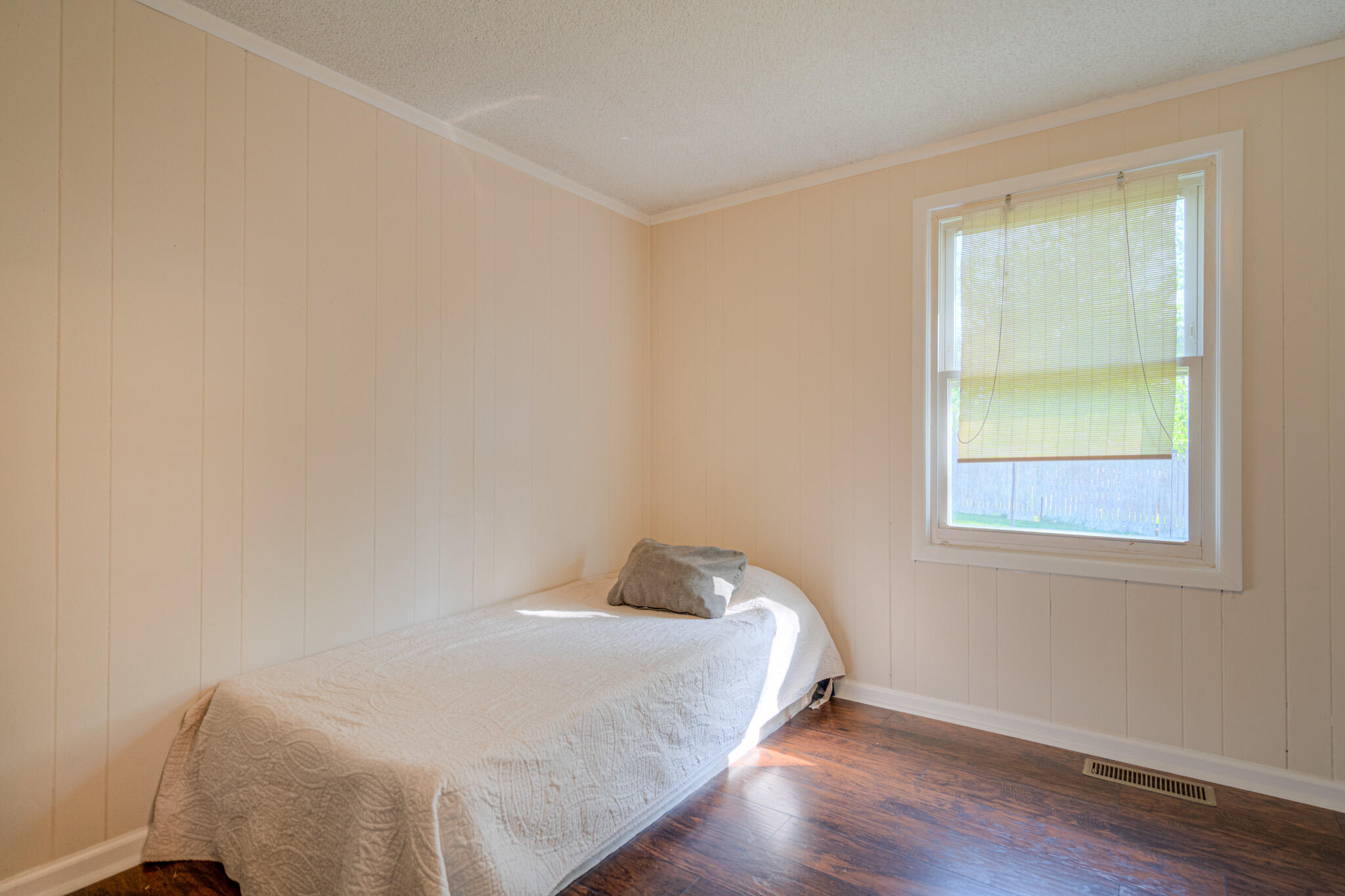5216 Colonial Drive Dublin, VA 24084 - Photo 21 of 31 a bedroom with a bed and a window