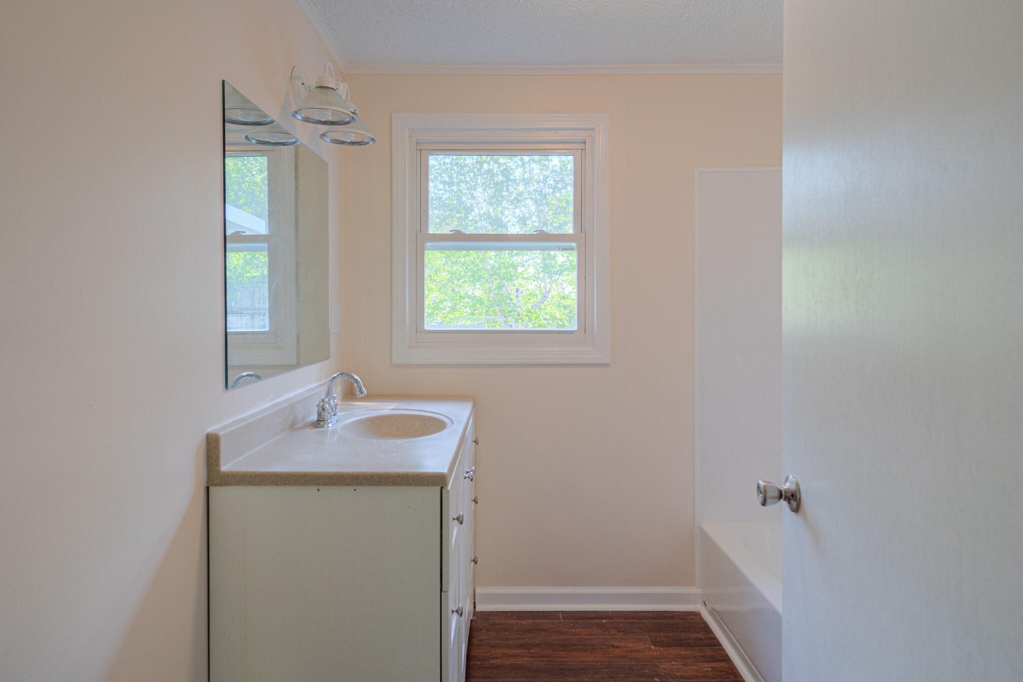 5216 Colonial Drive Dublin, VA 24084 - Photo 25 of 31 a bathroom with a sink and a window
