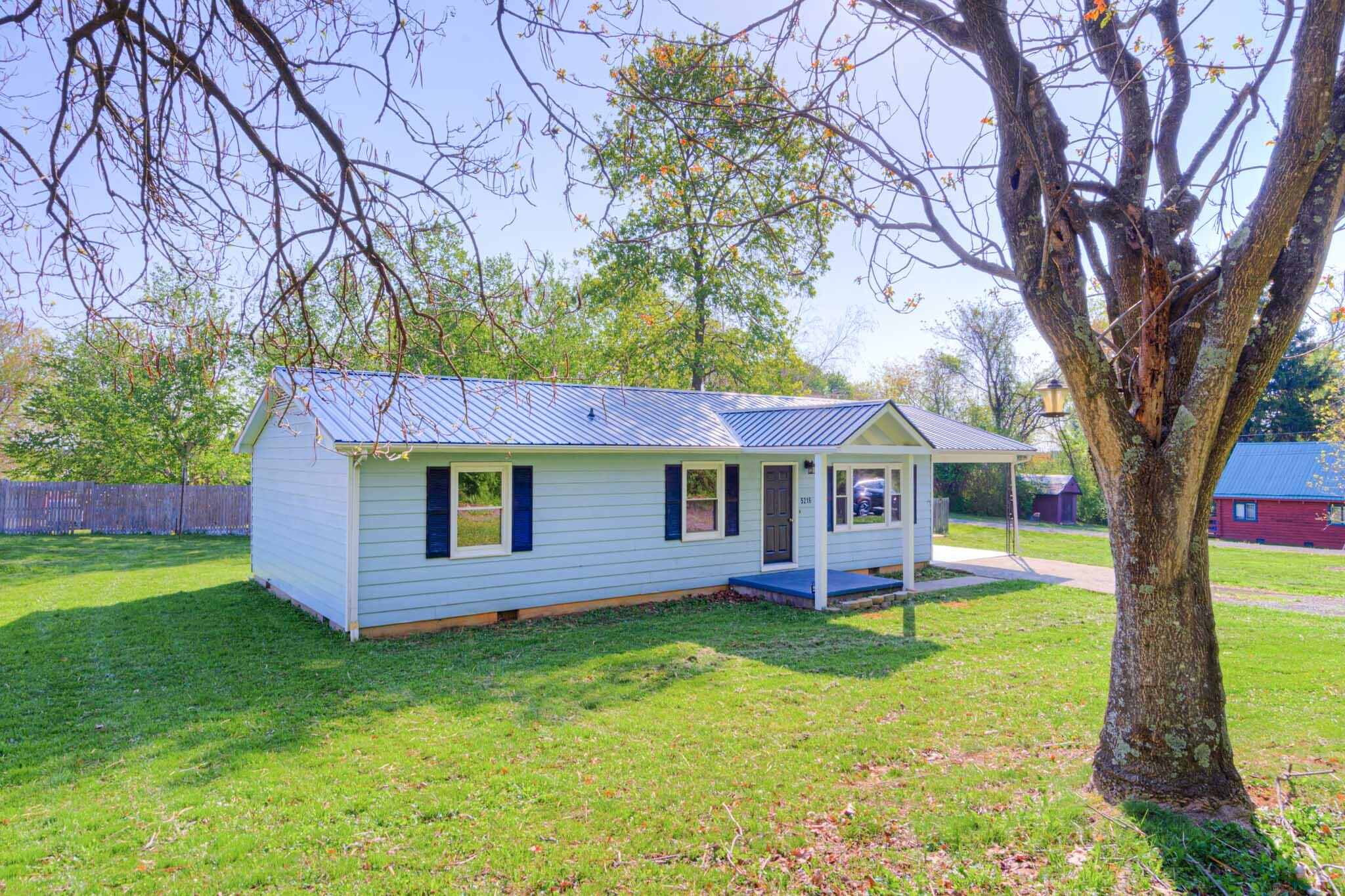5216 Colonial Drive Dublin, VA 24084 - Photo 27 of 31 front view of a house with a yard