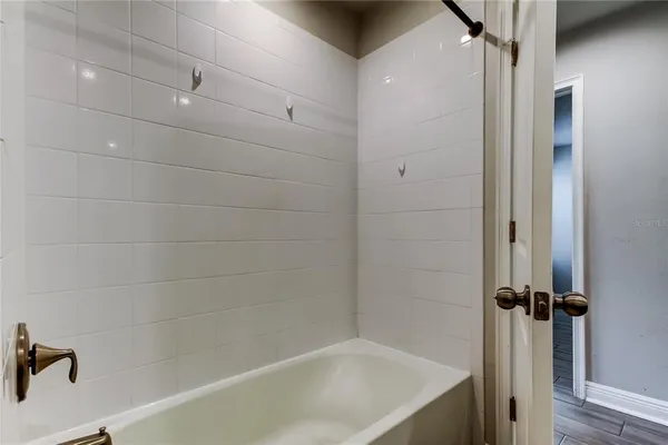 a bathroom with a double vanity sink and mirror