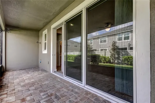 a view of a glass door of the house