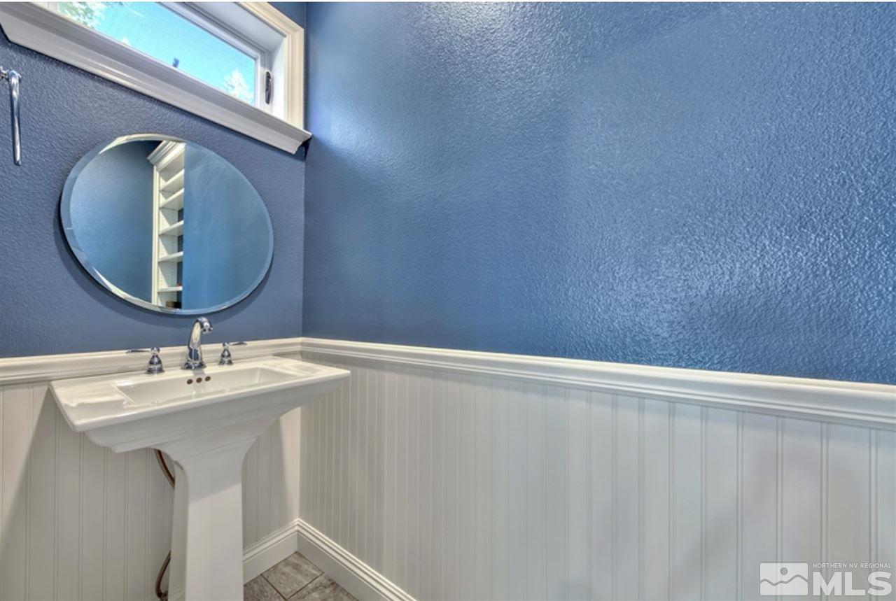 170 Granite Drive Stateline, NV 89449 - Photo 21 of 25 a bathroom with a sink and a mirror