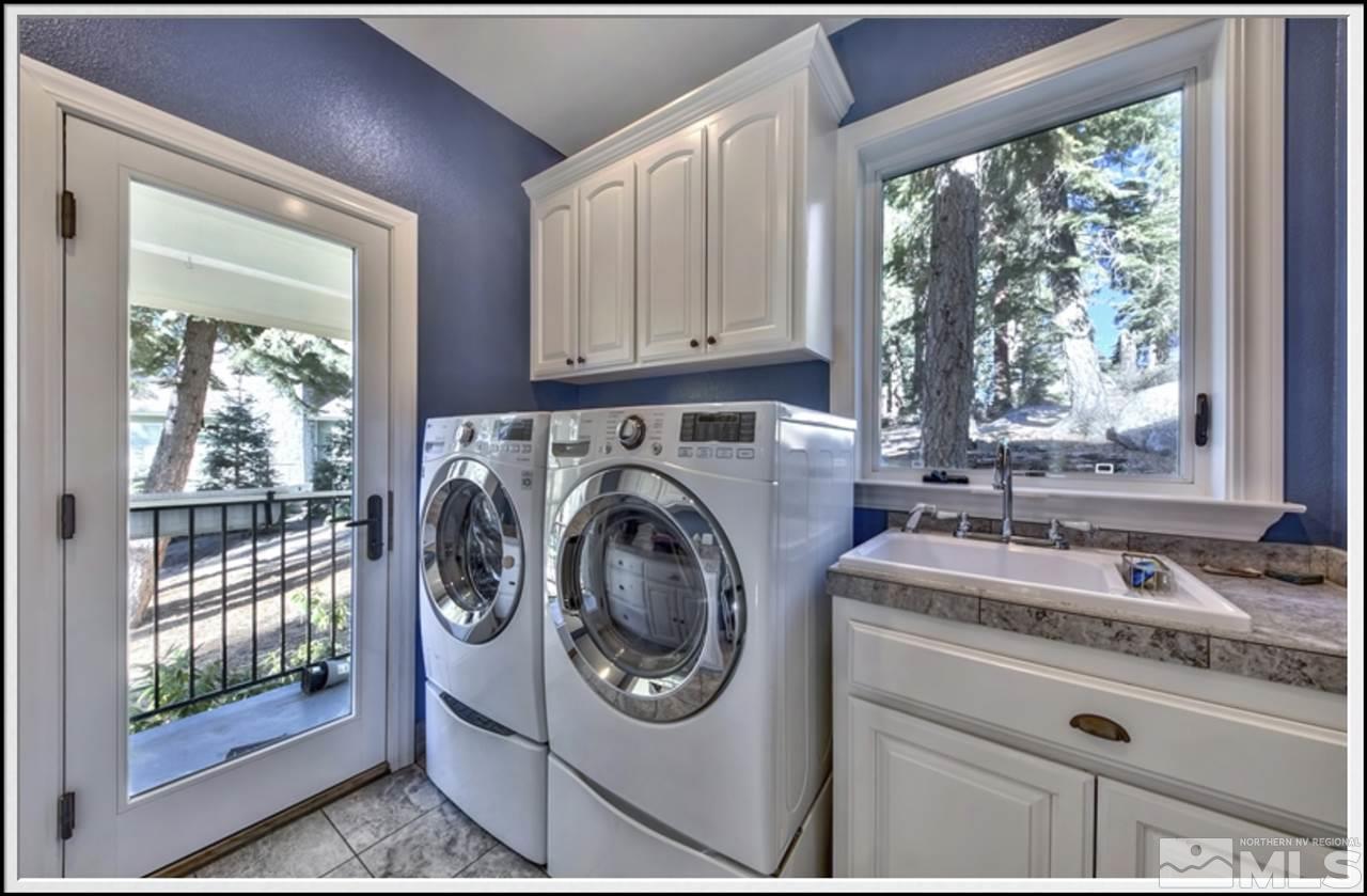 170 Granite Drive Stateline, NV 89449 - Photo 24 of 25 a utility room with sink dryer and washer