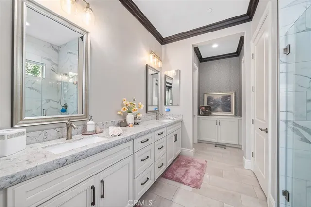 an outdoor sitting area with couch and a fire pit