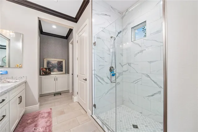 a view of patio with couches table and chairs and potted plants