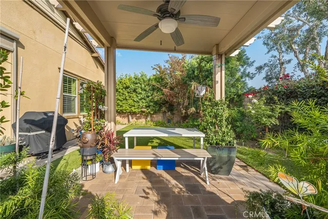 an aerial view of residential houses with outdoor space and swimming pool