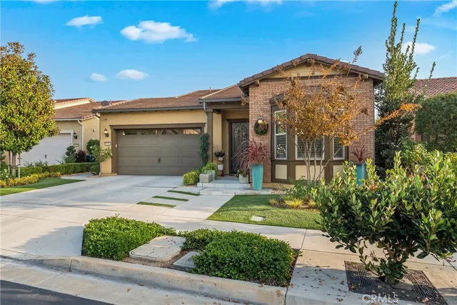 an aerial view of a house with a swimming pool