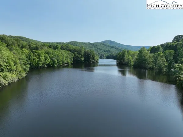 a view of a lake with a mountain