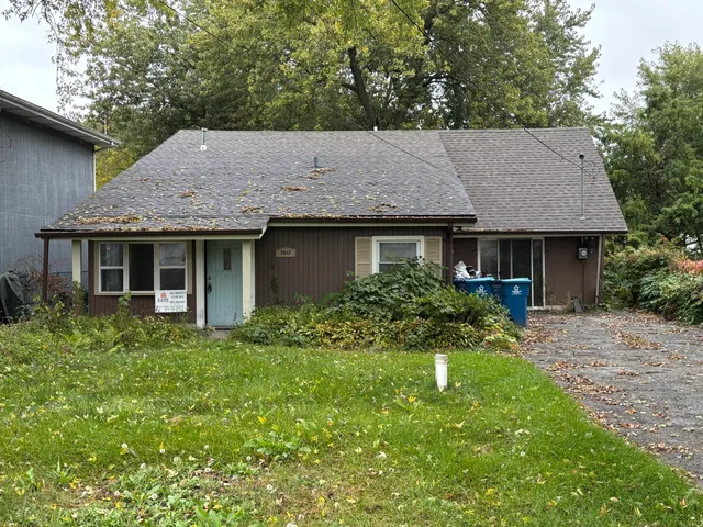 a house view with a garden space