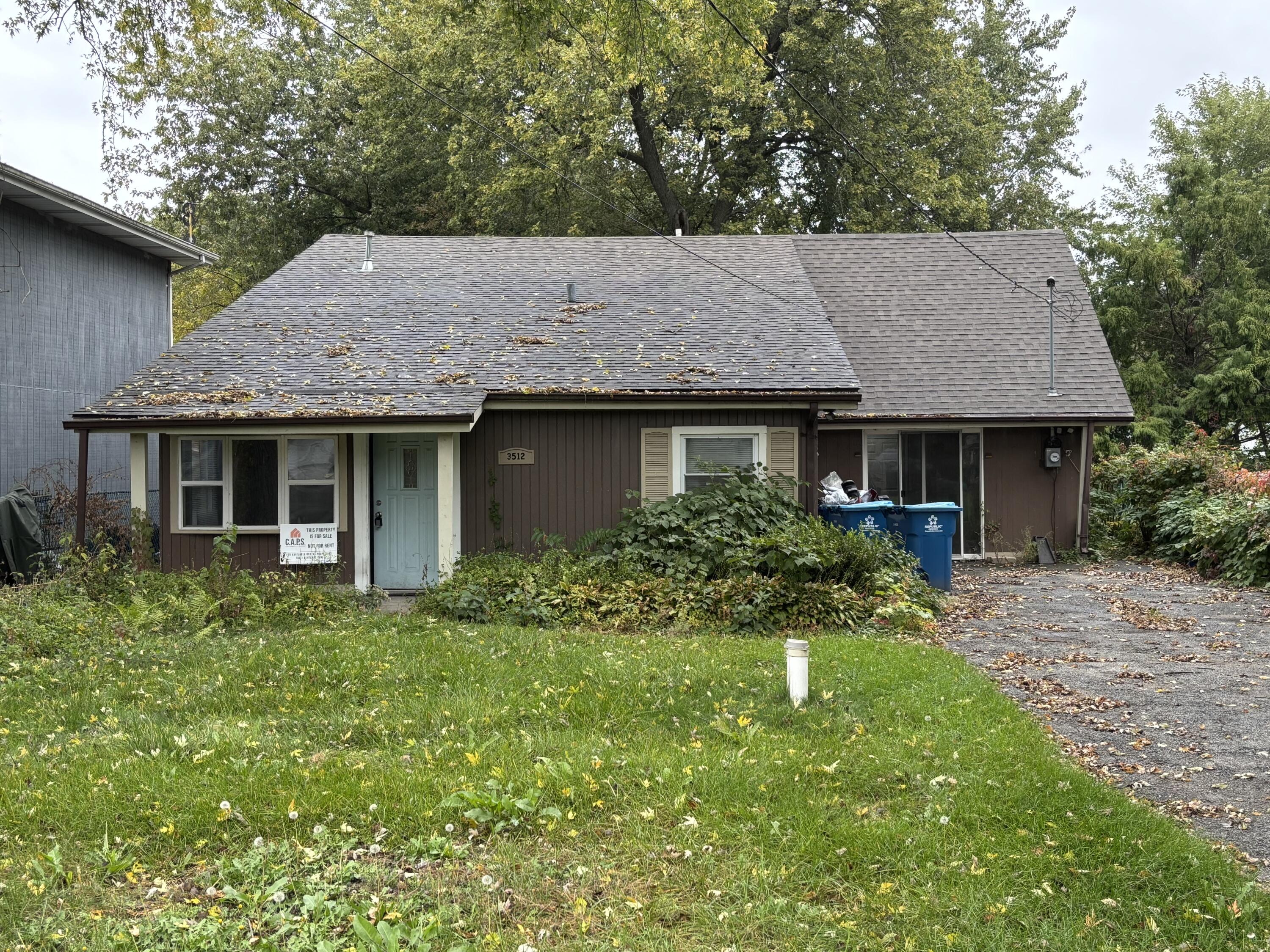3512 West 48th Court Gary, IN 46408 - Photo 1 of 16 a house view with a garden space