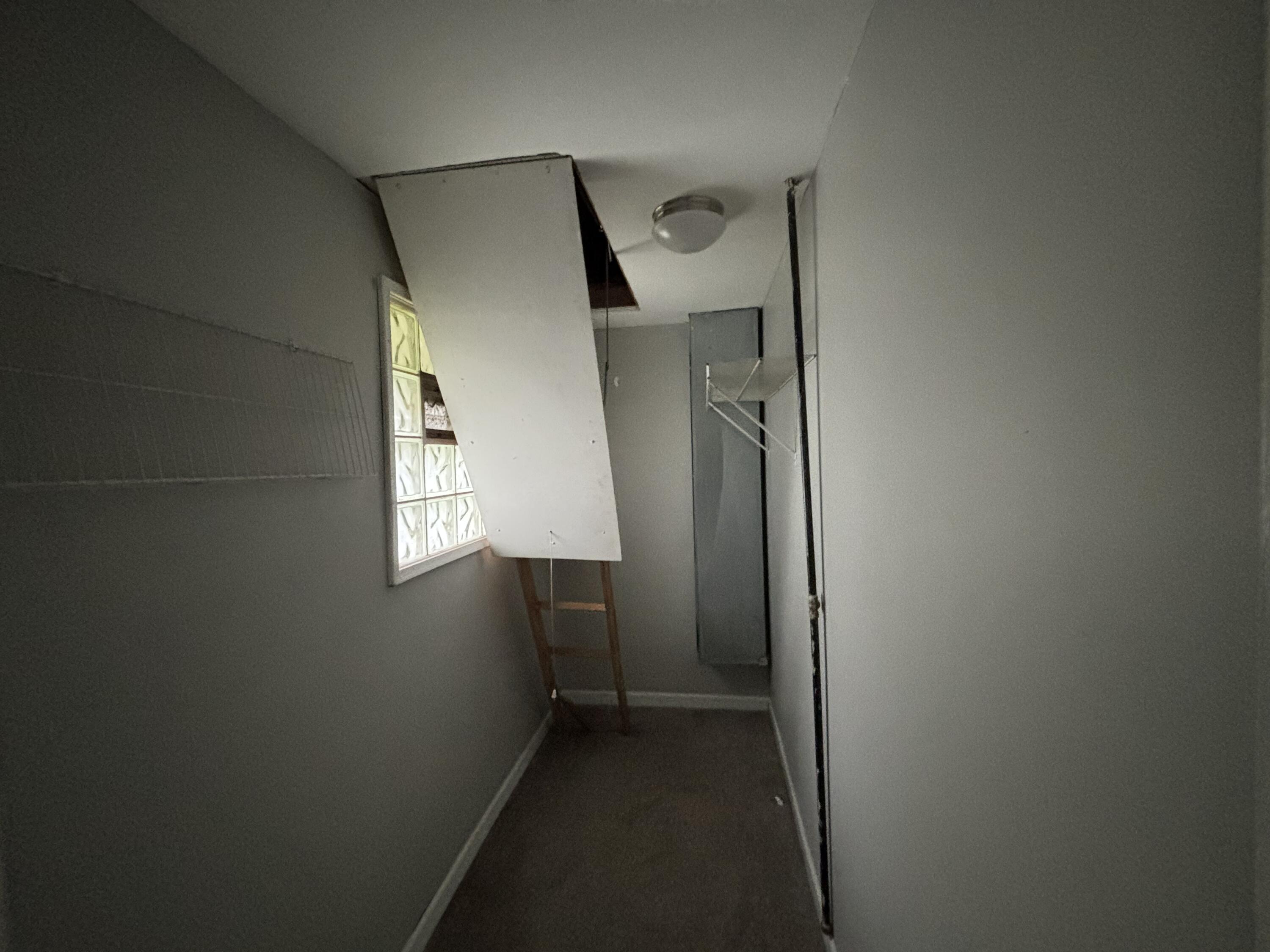 3512 West 48th Court Gary, IN 46408 - Photo 11 of 16 a view of hallway with stairs