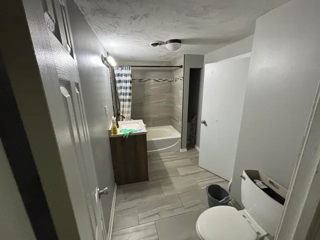 a bathroom with a sink and mirror