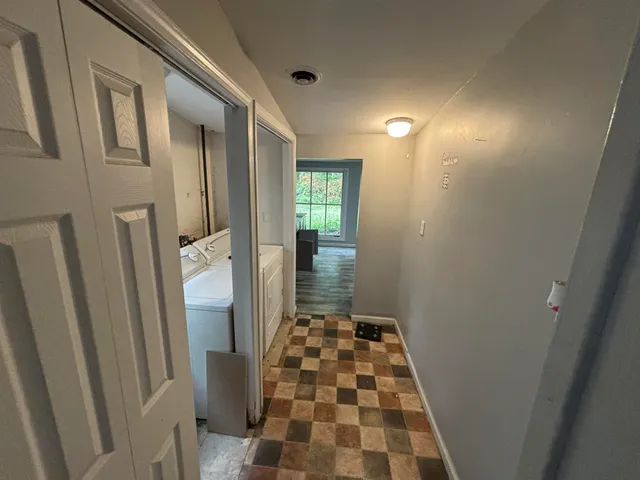 a bathroom with a sink and a shower