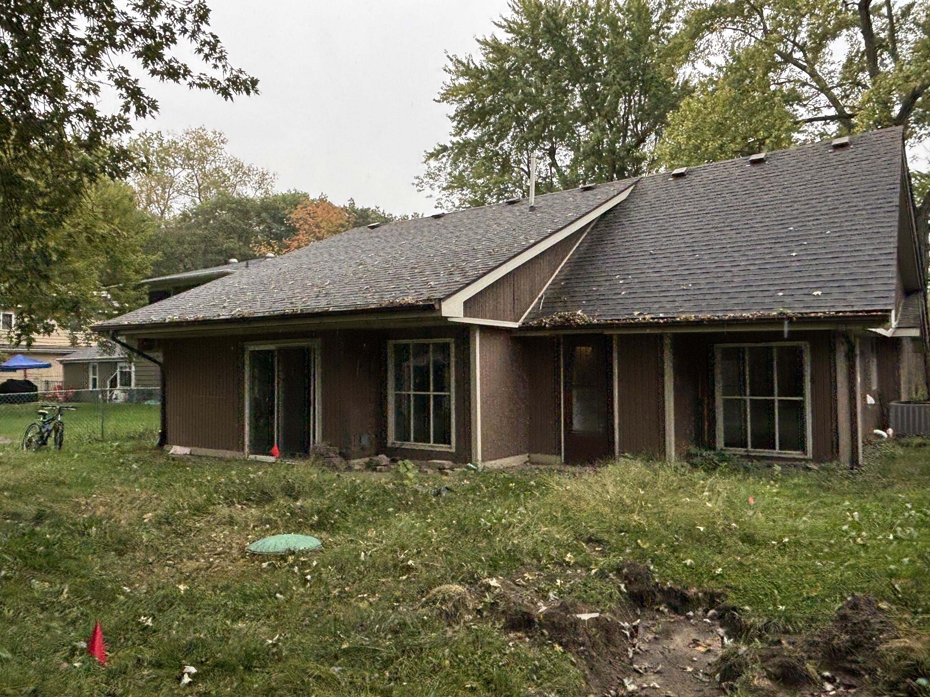 3512 West 48th Court Gary, IN 46408 - Photo 2 of 16 a front view of a house with garden