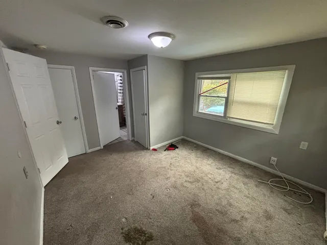 an empty room with windows