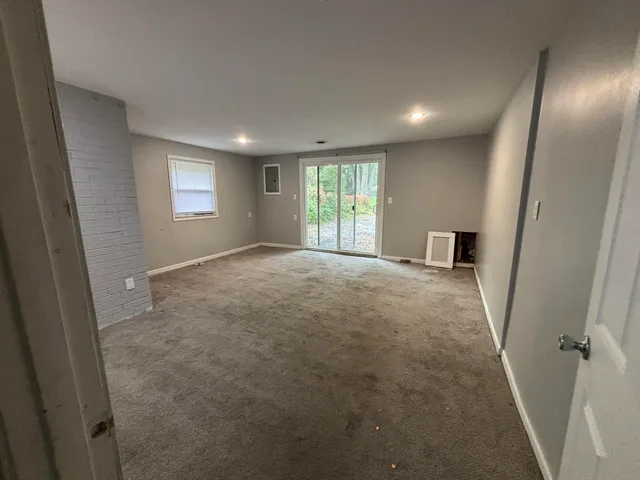 a view of a livingroom with a staircase