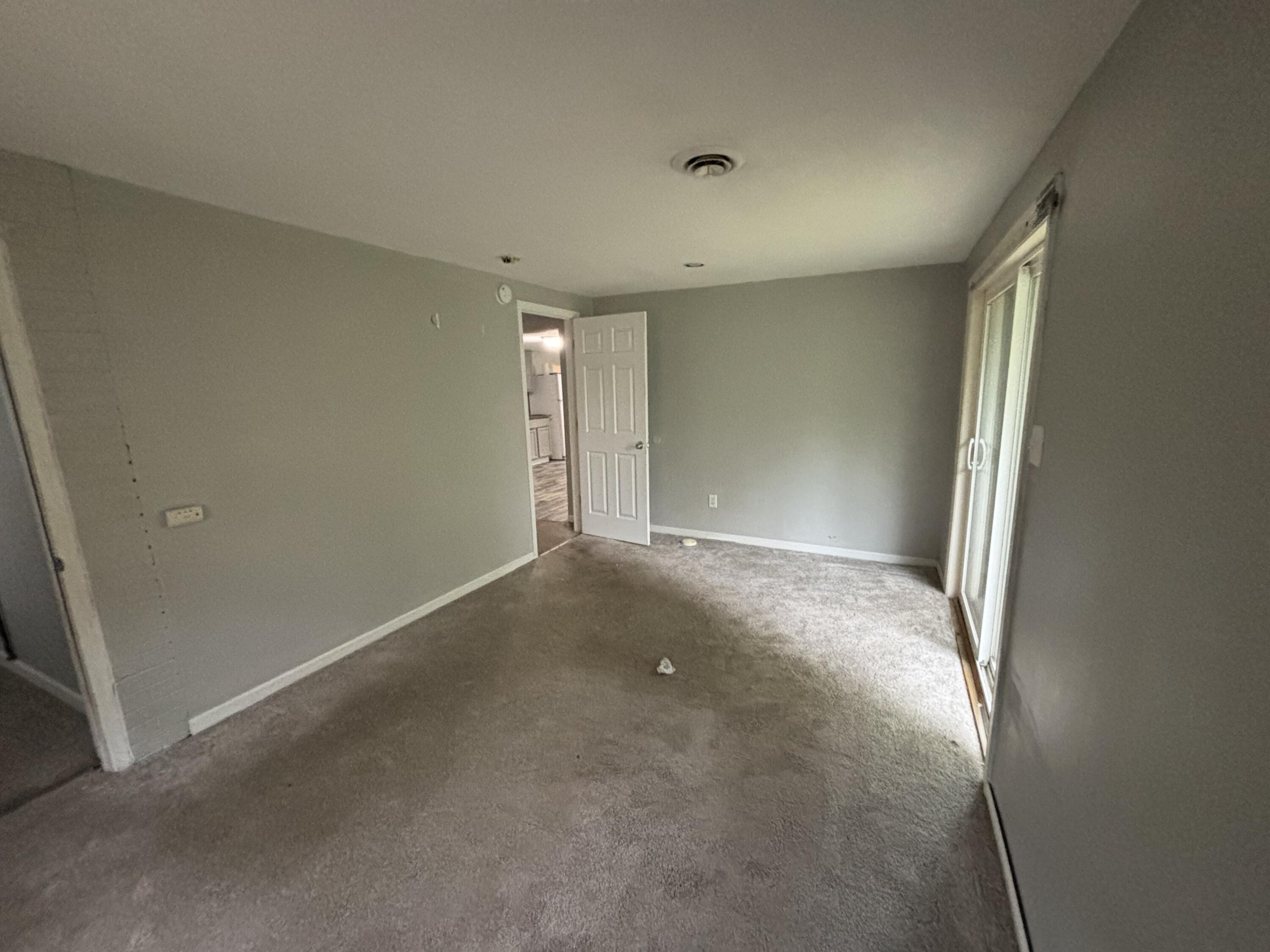 3512 West 48th Court Gary, IN 46408 - Photo 10 of 16 an empty room with windows