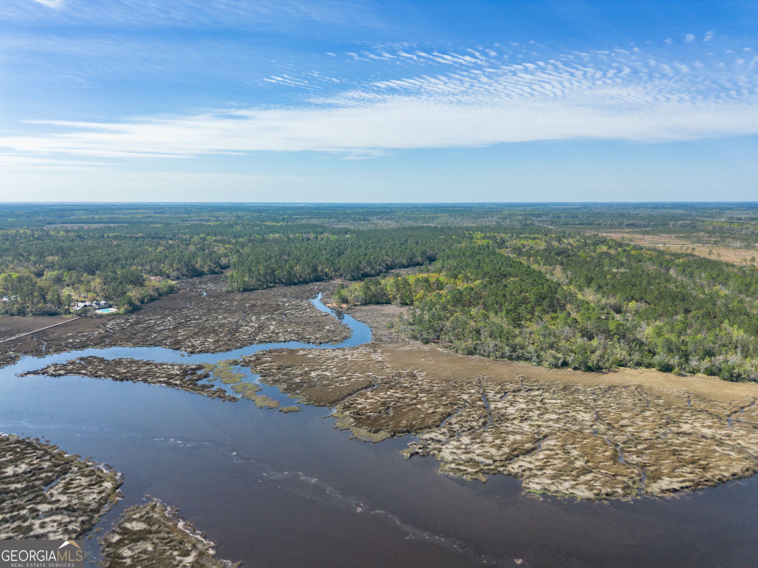 a view of a beach with an ocean beach