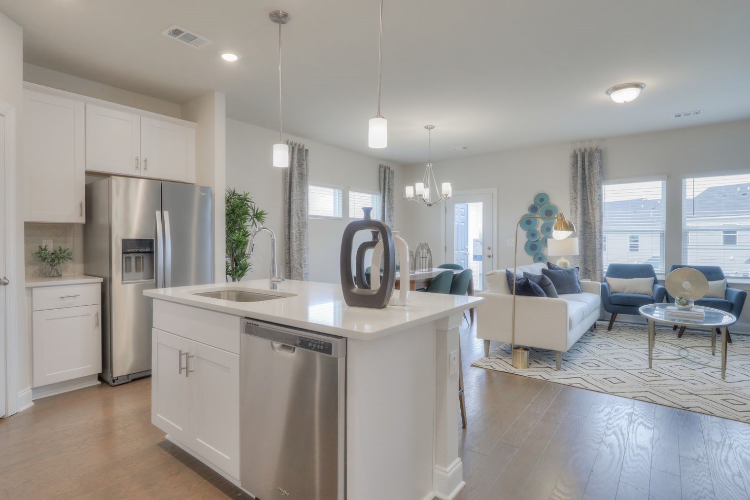 4677 Ridge Bend Drive Nashville, TN 37207 - Photo 2 of 14 a kitchen with white cabinets and stainless steel appliances